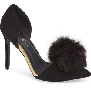 Black pumps with Pom Poms